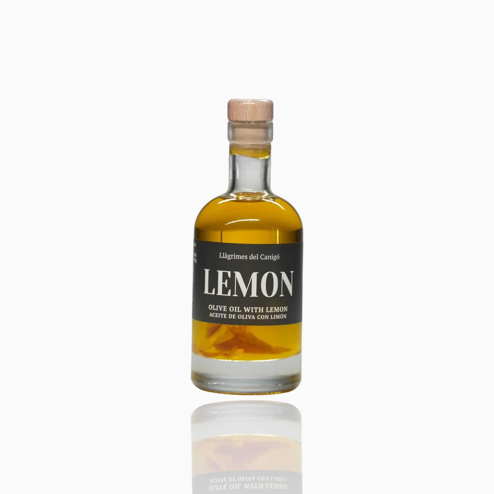 Glass bottle of lemon-infused olive oil, 100ml, with natural lemon zest.